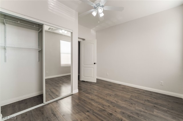 5940 Tamarack Lodge Ln, North Las Vegas, NV 89081 - unfurnished bedroom with dark wood-type flooring, a closet, and baseboards