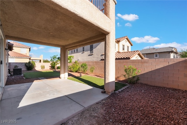 5940 Tamarack Lodge Ln, North Las Vegas, NV 89081 - view of patio / terrace with a fenced backyard and central air condition unit