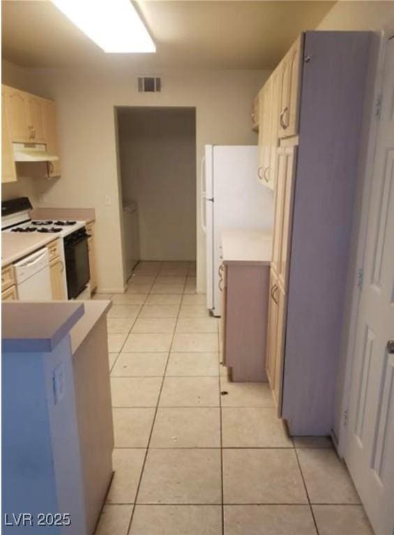 7709 Bauble Ave, Las Vegas, NV 89128 - kitchen featuring visible vents, white appliances, a peninsula, under cabinet range hood, and light tile patterned flooring