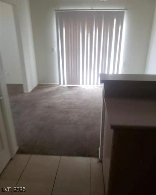 7709 Bauble Ave, Las Vegas, NV 89128 - interior space featuring tile patterned flooring and carpet