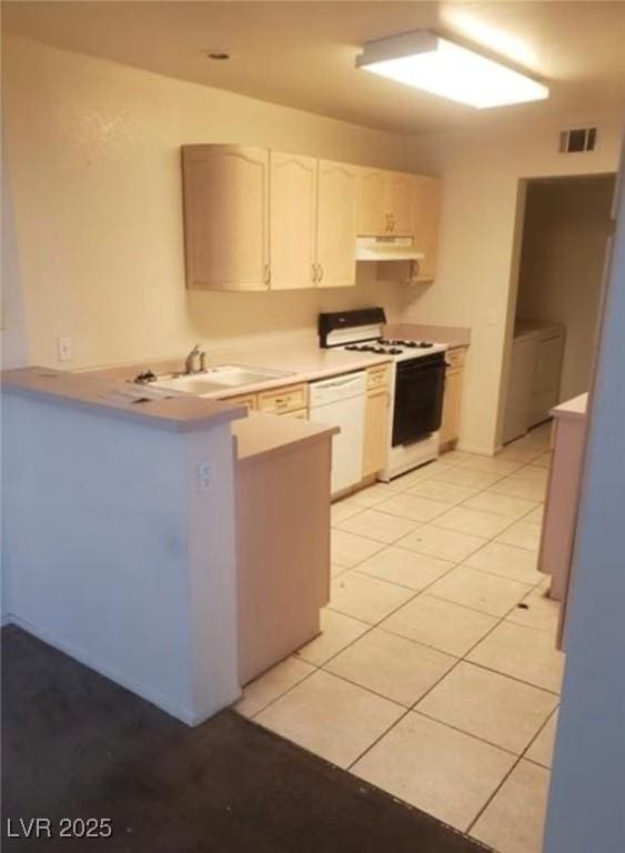 7709 Bauble Ave, Las Vegas, NV 89128 - kitchen with visible vents, white cabinets, a sink, white appliances, and a peninsula