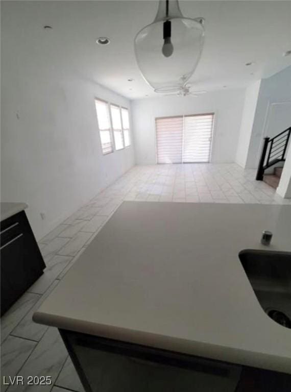 garage with ceiling fan