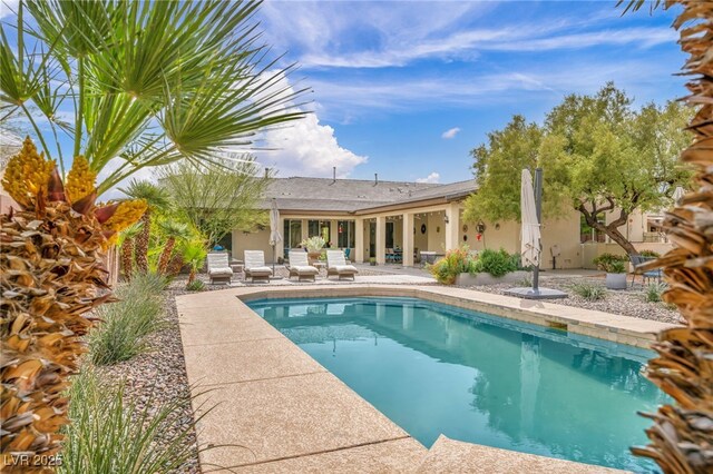 outdoor pool with a patio