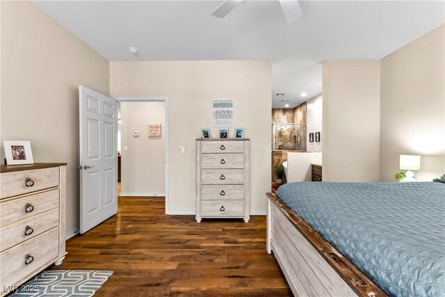 bedroom with dark wood-style floors, baseboards, recessed lighting, ceiling fan, and ensuite bath