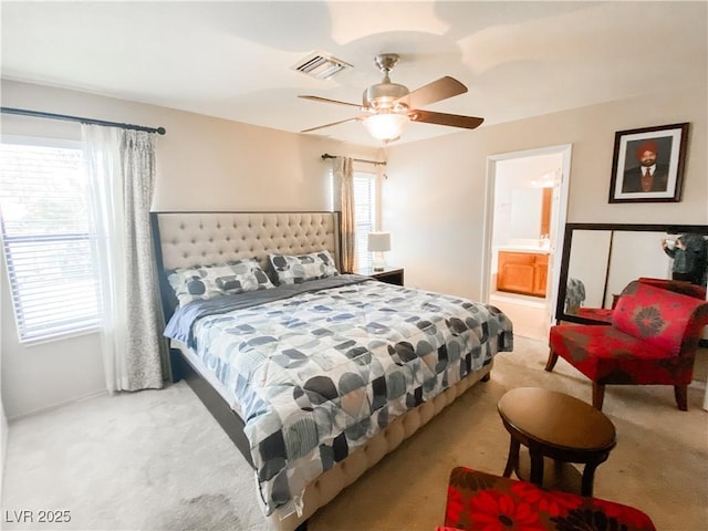 bedroom featuring visible vents, a ceiling fan, and carpet