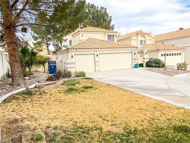 view of front of property featuring driveway, a tile roof, a garage, and stucco siding