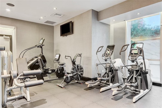 exercise room featuring visible vents