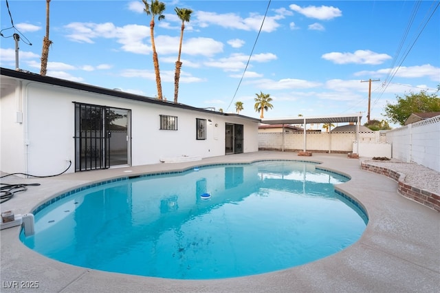 view of swimming pool with a fenced in pool, a patio, and a fenced backyard