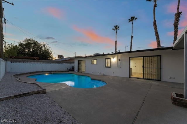 view of swimming pool featuring a patio, a fenced backyard, and a fenced in pool