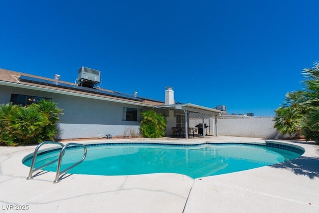 view of swimming pool with a patio area and a fenced in pool