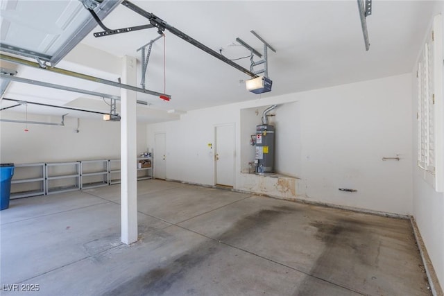 garage with water heater and a garage door opener