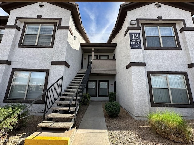 exterior space featuring stucco siding
