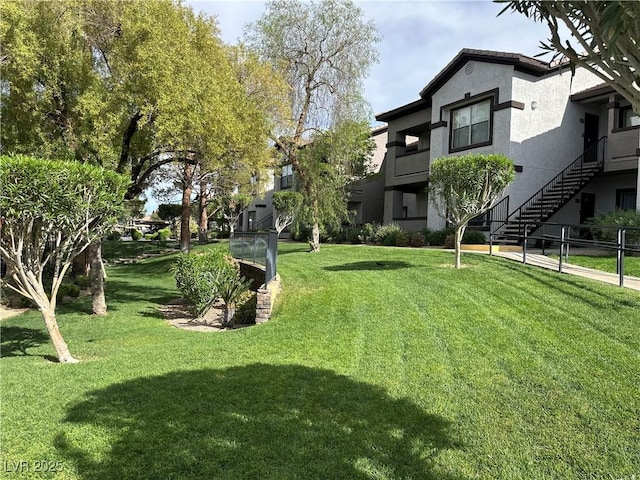 surrounding community featuring a lawn