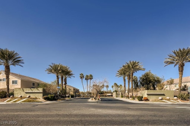 3908 Specula Wing Dr, North Las Vegas, NV 89084 - view of asphalt road featuring curbs and sidewalks