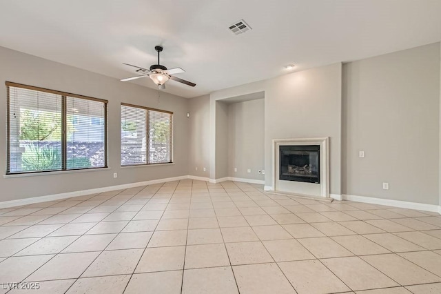 3908 Specula Wing Dr, North Las Vegas, NV 89084 - unfurnished living room with ceiling fan, healthy amount of natural light, and light tile patterned flooring