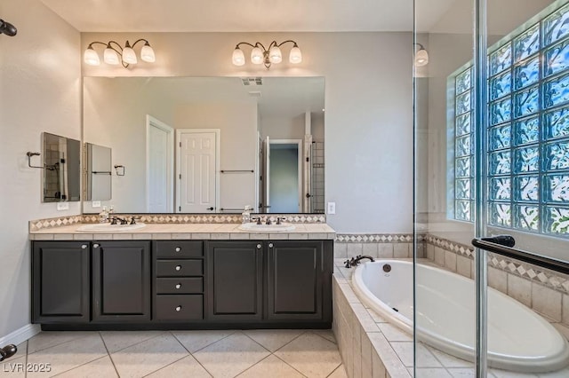 3908 Specula Wing Dr, North Las Vegas, NV 89084 - full bathroom featuring double vanity, a bath, and tile patterned flooring