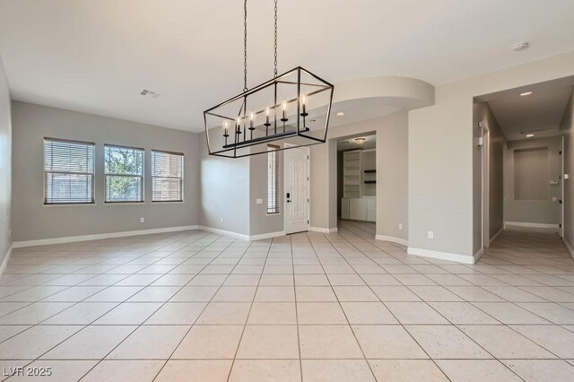 3908 Specula Wing Dr, North Las Vegas, NV 89084 - unfurnished dining area with light tile patterned flooring and recessed lighting