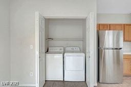 laundry area with washer and dryer and laundry area