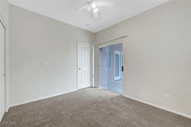 unfurnished room featuring ceiling fan, baseboards, and carpet floors