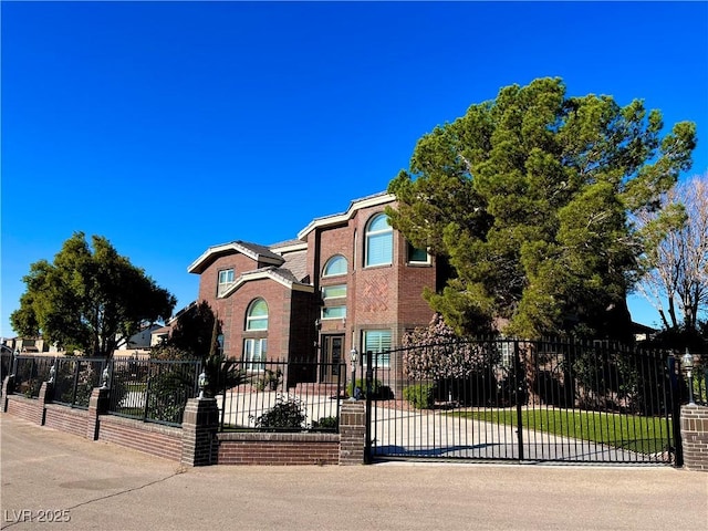 8690 W Ford Ave, Las Vegas, NV 89148 - view of front of home featuring a fenced front yard and brick siding