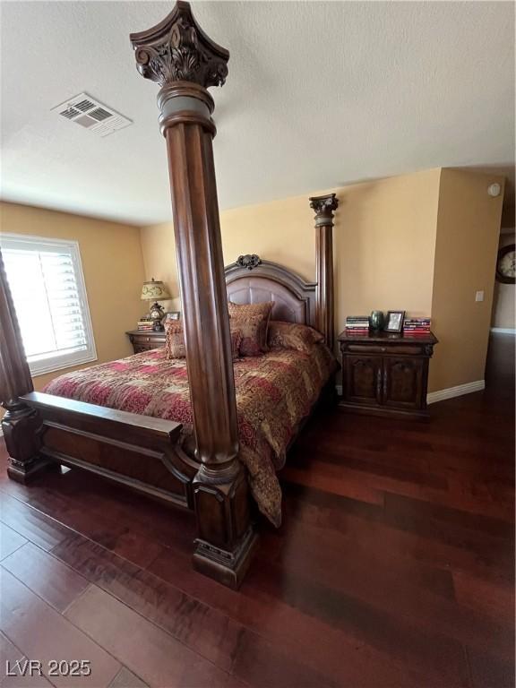 8690 W Ford Ave, Las Vegas, NV 89148 - bedroom with wood finished floors