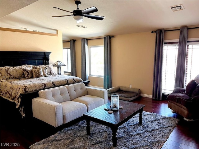 8690 W Ford Ave, Las Vegas, NV 89148 - bedroom featuring multiple windows, hardwood / wood-style floors, baseboards, and ceiling fan