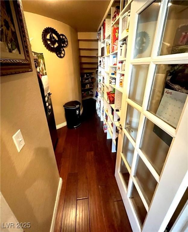 8690 W Ford Ave, Las Vegas, NV 89148 - corridor featuring dark wood-style flooring