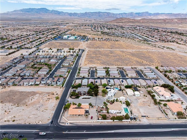 8690 W Ford Ave, Las Vegas, NV 89148 - aerial view of property and surrounding area featuring mountains and nearby suburban area