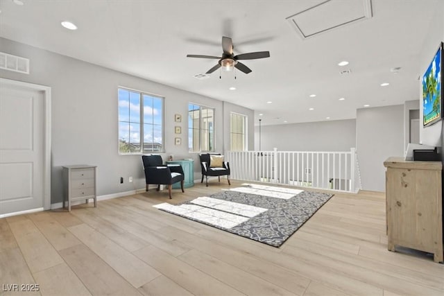 sitting room featuring ceiling fan, light wood-style flooring, recessed lighting, and baseboards