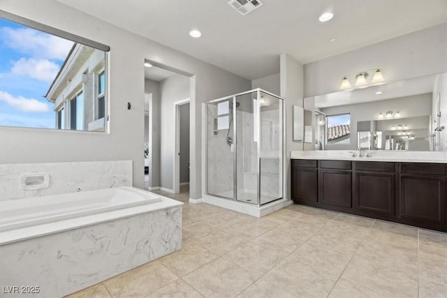 full bath featuring a stall shower, vanity, a garden tub, tile patterned flooring, and recessed lighting