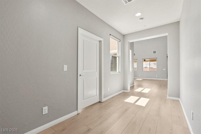 3062 Echoed Rondel Ln, Henderson, NV 89044 - corridor featuring light wood-style flooring