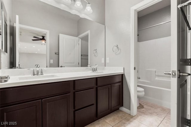 3062 Echoed Rondel Ln, Henderson, NV 89044 - full bathroom with double vanity, a ceiling fan, tile patterned flooring, and shower / washtub combination