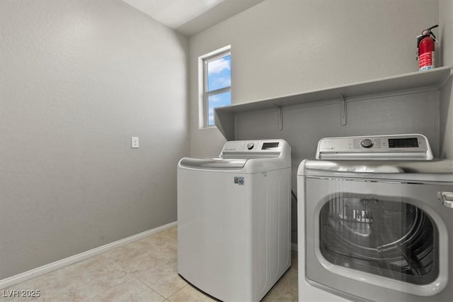 3062 Echoed Rondel Ln, Henderson, NV 89044 - laundry area featuring washer and clothes dryer and baseboards