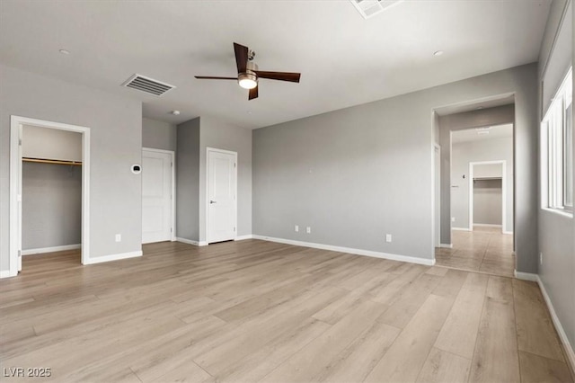 3062 Echoed Rondel Ln, Henderson, NV 89044 - unfurnished bedroom featuring light wood-style floors and ceiling fan