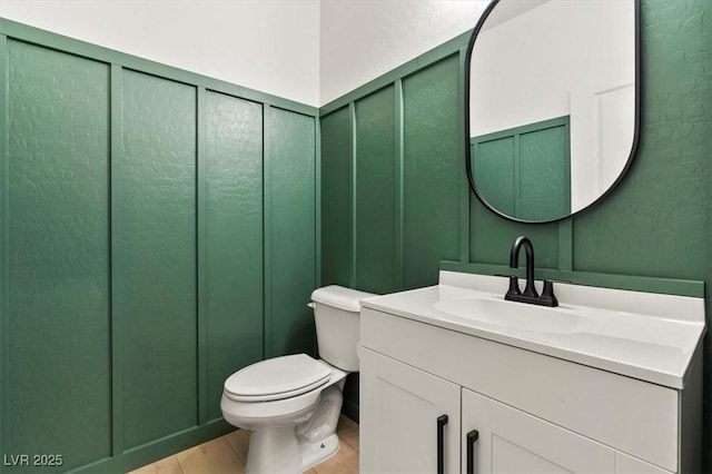 3062 Echoed Rondel Ln, Henderson, NV 89044 - bathroom with a decorative wall, vanity, and a textured wall