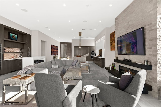 387 Solitude Peak Ln, Henderson, NV 89012 - living room featuring a fireplace and recessed lighting