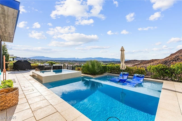 387 Solitude Peak Ln, Henderson, NV 89012 - outdoor pool with a patio and a mountain view
