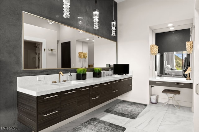 387 Solitude Peak Ln, Henderson, NV 89012 - bathroom featuring double vanity, a sink, and marble finish floor