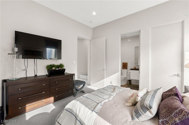 387 Solitude Peak Ln, Henderson, NV 89012 - carpeted bedroom featuring recessed lighting and ensuite bath