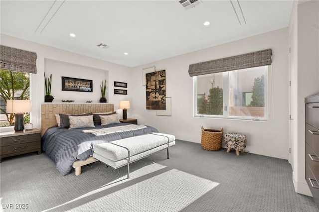 387 Solitude Peak Ln, Henderson, NV 89012 - bedroom with visible vents, recessed lighting, and light carpet