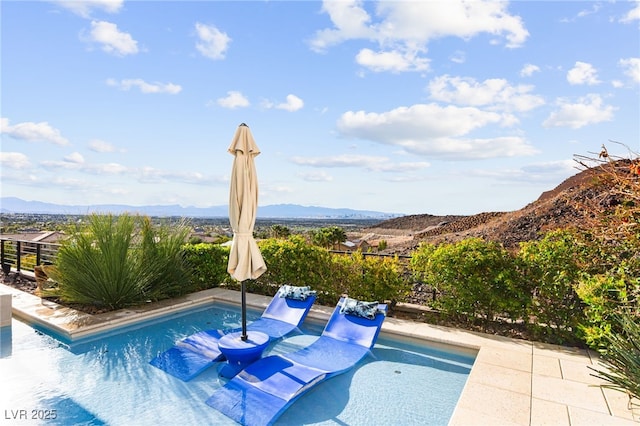 387 Solitude Peak Ln, Henderson, NV 89012 - view of swimming pool featuring a fenced in pool and a mountain view