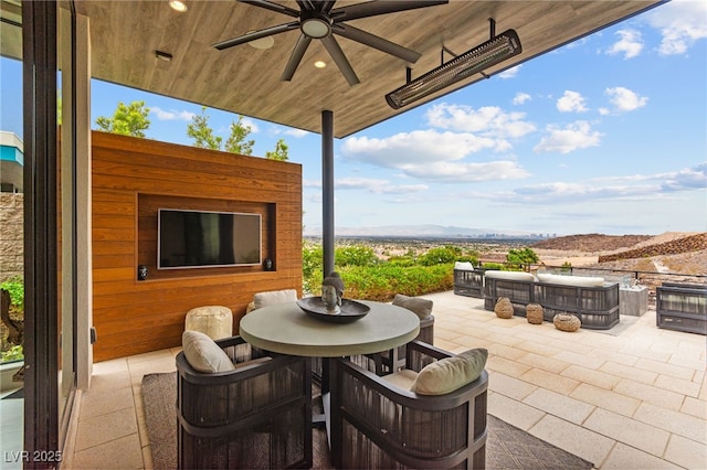 387 Solitude Peak Ln, Henderson, NV 89012 - view of patio / terrace featuring a ceiling fan and outdoor dining area