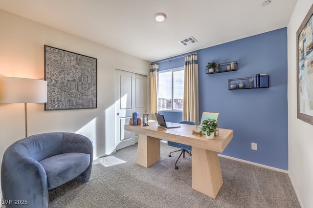 office area with baseboards, visible vents, and carpet floors