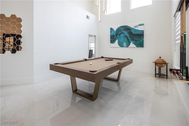 recreation room with billiards table, healthy amount of natural light, baseboards, a high ceiling, and light tile patterned floors