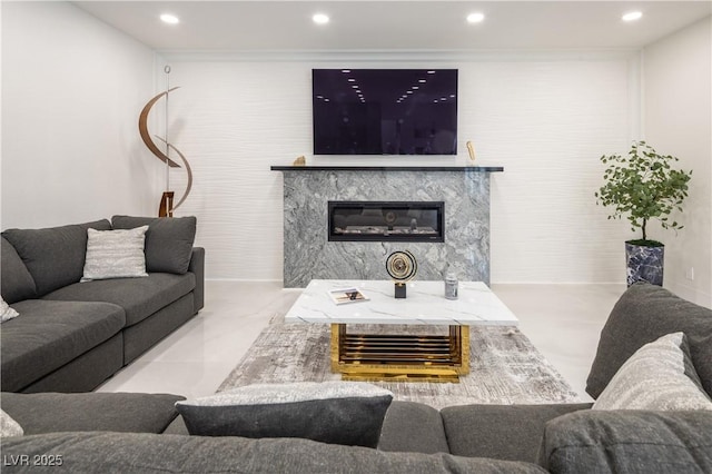 8000 Clock Tower Ct, Las Vegas, NV 89117 - living area with recessed lighting, concrete floors, and a premium fireplace