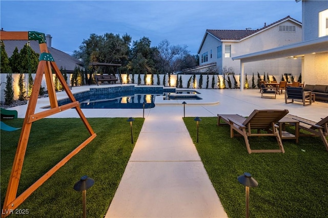 8000 Clock Tower Ct, Las Vegas, NV 89117 - view of swimming pool with a yard, a patio, outdoor lounge area, and a pool with connected hot tub