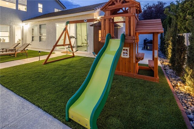 view of play area featuring a yard