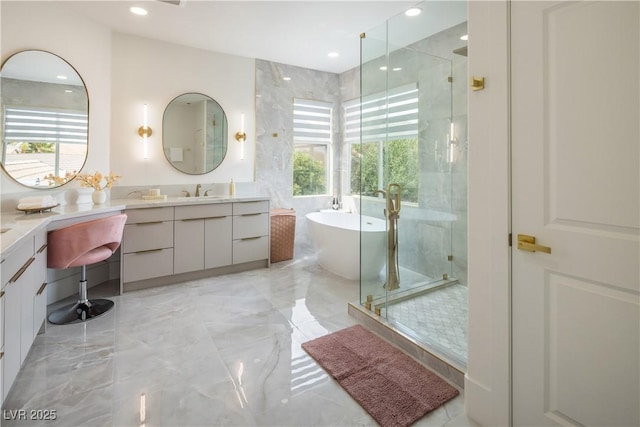 8000 Clock Tower Ct, Las Vegas, NV 89117 - full bathroom featuring plenty of natural light, vanity, a stall shower, a soaking tub, and recessed lighting