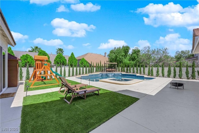 view of pool featuring a patio area and a jacuzzi