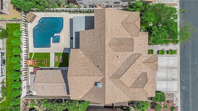 view of subject property featuring a pool